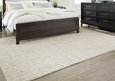 Bay Furniture Gallery - Ashley Furniture - Varahill Rug - 8' x 10' Rug / Gray/Ivory - R406931